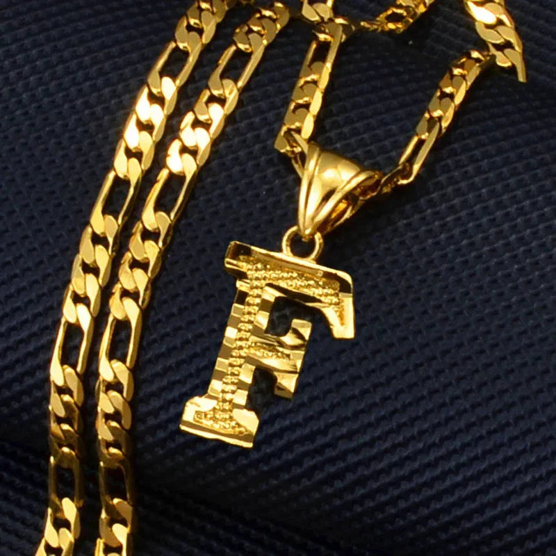 Gold plated pendant necklace with a letter "F" on a Figaro chain for women, men, and girls.