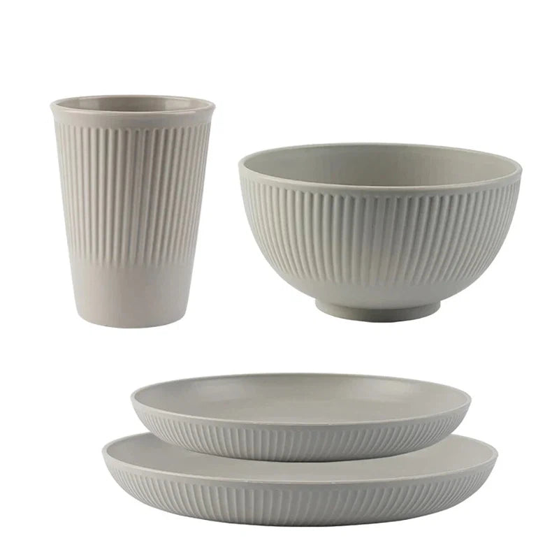 4-piece wheat straw tableware set including plate, dish, bowl, and cup, unbreakable and eco-friendly, ideal for kitchen or camping dinnerware.