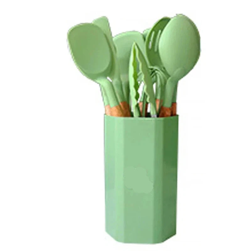 11-piece silicone cooking utensils set with wooden handles in green holder.