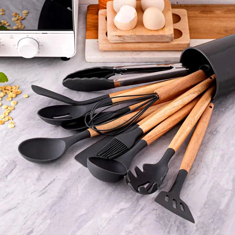 12-piece silicone kitchen utensil set with wooden handles and storage bucket, high temperature resistant and non-stick.