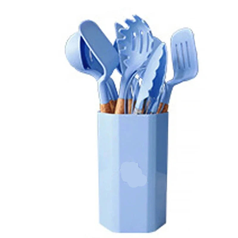 11-piece silicone cooking utensil set with wooden handles in holder.