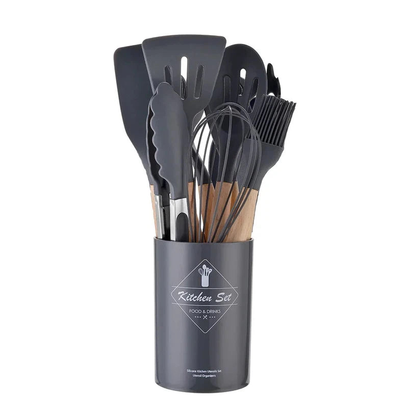 12-piece non-stick silicone kitchen utensils set with wooden handles, includes spatula, shovel, and egg beaters.