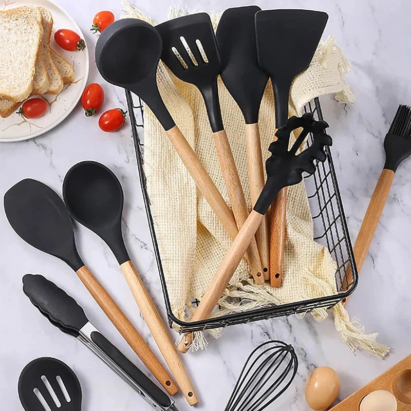 12-piece silicone kitchen utensils with wooden handles in a storage bucket, eco-friendly and heat resistant.