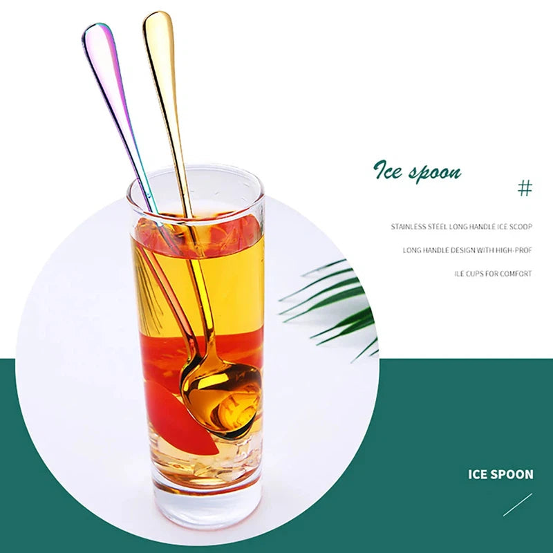 Stainless steel long handle spoons in a glass of iced tea.