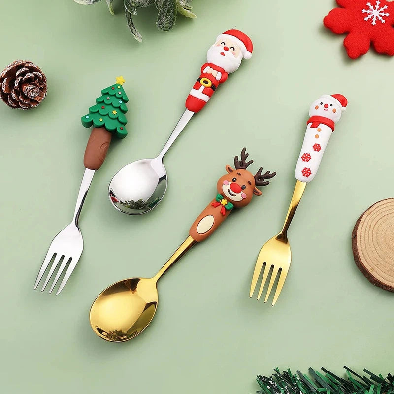 Christmas cutlery set with creative cartoon doll designs, including stainless steel dessert spoons and forks.