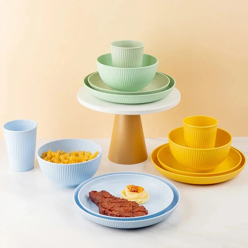 4-piece wheat straw tableware set with plate, dish, bowl, and cup, unbreakable and eco-friendly dinnerware for camping.