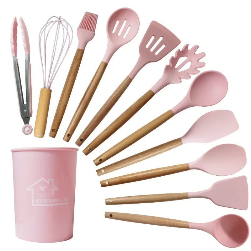 12-piece silicone non-stick kitchen utensil set with wooden handles, including spatula and egg beaters.