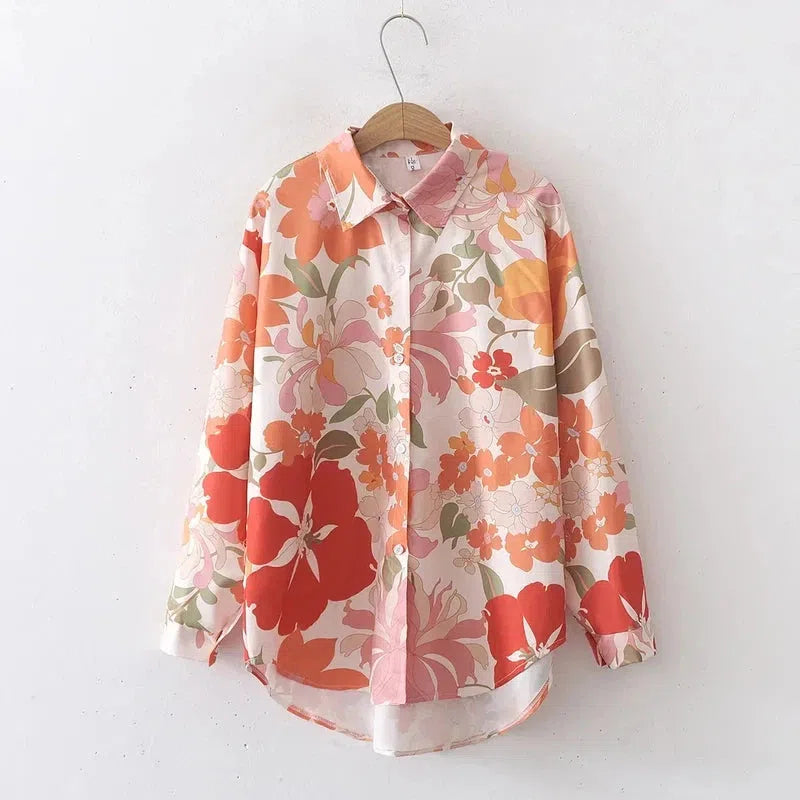 Vintage floral blouse with turn-down collar, casual streetwear style for women, made from broadcloth polyester, ideal for spring and summer.