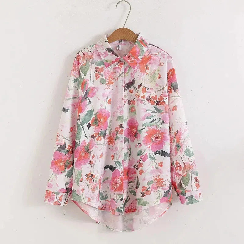 Floral print blouse with turn-down collar, full sleeves, and slight stretch fabric for women.