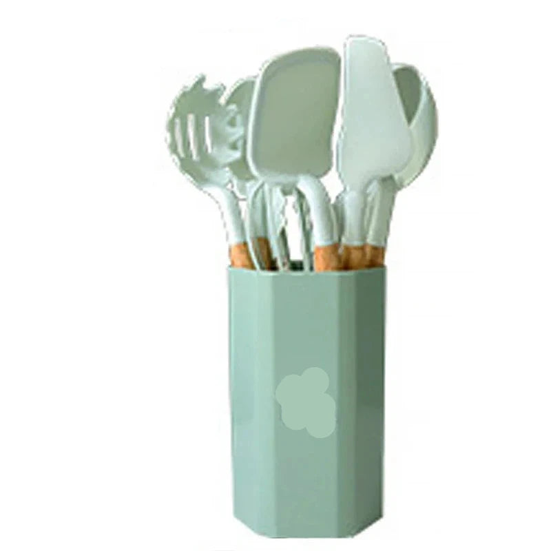 11-piece silicone cooking utensils set with wooden handles in holder.