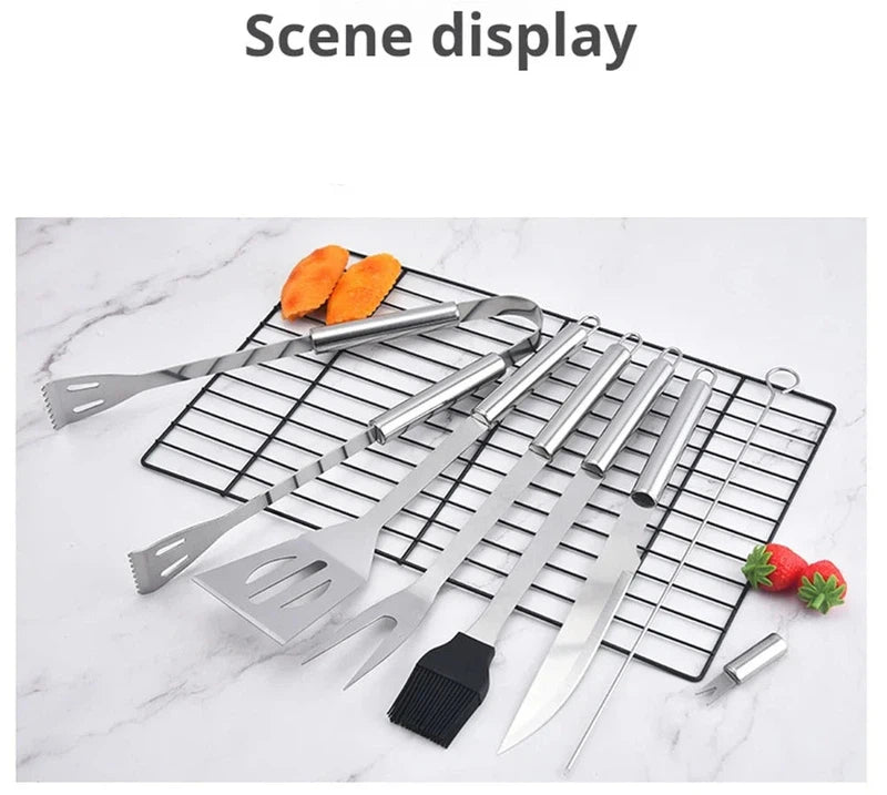 Stainless steel barbecue accessory kit, 9-piece set with various tools displayed on a grill mat.