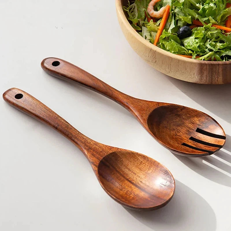 Wooden spoon and fork set with long handles for serving salad, Japanese style tableware.